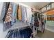 Walk-in closet with organized shelving and hanging space for clothing at 12 Valley Forge Nw Pl # 215, Atlanta, GA 30318