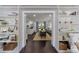 View from living room showcasing dining area with natural light and stylish décor at 12 Valley Forge Nw Pl # 215, Atlanta, GA 30318