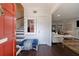 Inviting foyer featuring hardwood floors, decorative mirror, and seamless flow into the living space at 12 Valley Forge Nw Pl # 215, Atlanta, GA 30318
