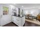 Open-concept kitchen with an island, stainless appliances, and easy access to the dining area at 12 Valley Forge Nw Pl # 215, Atlanta, GA 30318