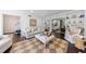 Spacious living room featuring a fireplace, built-in shelves, and an open layout at 12 Valley Forge Nw Pl # 215, Atlanta, GA 30318