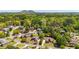 Aerial view of a neighborhood with the house pinpointed, surrounded by lush trees and mountains in the distance at 222 Rippling Nw Dr, Marietta, GA 30064