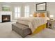 Cozy bedroom with a fireplace, neutral decor, and comfortable bedding creates a relaxing retreat at 222 Rippling Nw Dr, Marietta, GA 30064