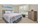 Cozy bedroom with a plush bed, a matching dresser, and natural light from a shuttered window at 222 Rippling Nw Dr, Marietta, GA 30064