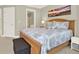 Comfortable bedroom with a coastal theme, featuring a queen-sized bed and ample natural light at 222 Rippling Nw Dr, Marietta, GA 30064