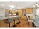 Spacious kitchen boasts granite counters, a large island, stainless appliances, and stylish bar stool seating at 222 Rippling Nw Dr, Marietta, GA 30064