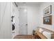 Bright mudroom with a barn door, seating bench, and convenient access to the laundry room at 5345 Keepsake Court, Cumming, GA 30040