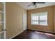 Bedroom featuring hardwood floors, fan and windows with natural lighting at 743 Pecan Knoll Dr # 5, Marietta, GA 30008