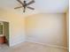 Spacious carpeted bedroom features ceiling fan and ensuite bathroom at 743 Pecan Knoll Dr # 5, Marietta, GA 30008