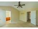 This bedroom features an ensuite bathroom and neutral colored walls at 743 Pecan Knoll Dr # 5, Marietta, GA 30008