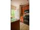 Kitchen showcasing granite counters, dark cabinets and access to an outdoor deck at 743 Pecan Knoll Dr # 5, Marietta, GA 30008