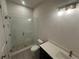 Modern bathroom featuring a glass-enclosed shower, mosaic floor, and sleek vanity at 123 Beardon Circle # 159, Atlanta, GA 30316