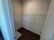 Walk-in closet with storage shelf and dark floors at 123 Beardon Circle # 159, Atlanta, GA 30316