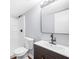 Bathroom with a walk-in shower, white toilet, and modern vanity with sink at 2352 S Hairston Rd, Decatur, GA 30035
