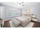 Cozy bedroom showcasing stylish decor, a comfortable bed, and bright natural light at 2352 S Hairston Rd, Decatur, GA 30035