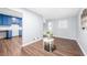 Open-concept living area featuring modern flooring and a peek into the adjacent kitchen at 2352 S Hairston Rd, Decatur, GA 30035