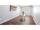 Bright living room with wood floors, a neutral color palette, and natural light at 2352 S Hairston Rd, Decatur, GA 30035