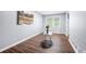 Cozy living room with modern decor, light gray walls, and rich brown flooring at 2352 S Hairston Rd, Decatur, GA 30035