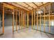 Unfinished basement featuring exposed ceiling and wood framework at 3228 Trinity Mill Cir, Dacula, GA 30019