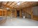 Unfinished basement featuring exposed ceiling and wood framework at 3228 Trinity Mill Cir, Dacula, GA 30019