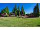 Stone monument at the entrance to The Grove at Hamilton Mill in a picturesque, landscaped setting at 3228 Trinity Mill Cir, Dacula, GA 30019