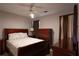 Inviting bedroom featuring warm lighting and dark wood furniture at 5713 Brynwood Nw Cir, Acworth, GA 30101