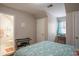 Charming bedroom with a view of an en-suite bathroom and a dedicated study space at 5713 Brynwood Nw Cir, Acworth, GA 30101