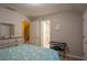 Well-lit bedroom with a view of an en-suite bathroom and a writing desk at 5713 Brynwood Nw Cir, Acworth, GA 30101
