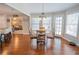 Cozy breakfast nook with wood floors, pendant lighting and backyard view at 5713 Brynwood Nw Cir, Acworth, GA 30101