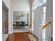 Elegant entryway with hardwood floors leading to the dining room at 5713 Brynwood Nw Cir, Acworth, GA 30101