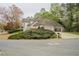 Exterior of well-maintained home with manicured landscaping, driveway and a two car garage at 5713 Brynwood Nw Cir, Acworth, GA 30101