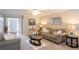 Comfortable living room featuring neutral tones and ample seating at 5713 Brynwood Nw Cir, Acworth, GA 30101