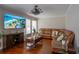 Comfortable living room featuring a large-screen TV and stylish decor at 5713 Brynwood Nw Cir, Acworth, GA 30101
