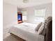 A cozy bedroom with natural lighting and carpet flooring at 3875 Ivy Run Cir, Duluth, GA 30096