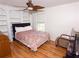 Bedroom featuring carpet flooring and a decorative ceiling fan at 3875 Ivy Run Cir, Duluth, GA 30096