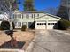 Charming two-story home featuring a two-car garage and traditional architecture at 3875 Ivy Run Cir, Duluth, GA 30096