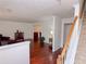 Open-concept living area with hardwood floors and lots of natural light at 3875 Ivy Run Cir, Duluth, GA 30096
