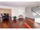 Spacious living room with hardwood floors, neutral color palette, and natural lighting at 3875 Ivy Run Cir, Duluth, GA 30096