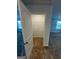 Walk-in closet with carpet flooring and wire shelving at 390 River Walk Farm Parkway Lot 47, Covington, GA 30014