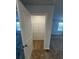Walk-in closet with wire shelving and carpeted floor at 390 River Walk Farm Parkway Lot 47, Covington, GA 30014