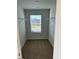 View of a walk-in closet with wire shelving and carpeted flooring at 390 River Walk Farm Parkway Lot 47, Covington, GA 30014