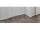 Beautiful and durable wood-look flooring adds warmth and elegance to this home's interior at 390 River Walk Farm Parkway Lot 47, Covington, GA 30014