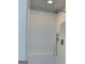 Modern shower featuring white subway tile and a glass enclosure at 390 River Walk Farm Parkway Lot 47, Covington, GA 30014