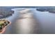 Aerial view of lake with sparkling water, golf course visible along the shore at 6048 Golf View Xing, Locust Grove, GA 30248