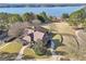 Aerial view of community clubhouse with lake in the background at 6048 Golf View Xing, Locust Grove, GA 30248