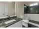 Bathroom featuring a modern vanity and a tiled shower with a built-in seat at 6048 Golf View Xing, Locust Grove, GA 30248