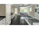Primary bath with glass shower, soaking tub, dual vanities and marble floors at 6048 Golf View Xing, Locust Grove, GA 30248