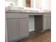Spacious bathroom featuring double sinks, granite countertops, and plenty of storage at 663 Egrets Landing Lot #55, Covington, GA 30014