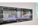 Modern electric fireplace with glass rocks provides a cozy focal point in the living room at 663 Egrets Landing Lot #55, Covington, GA 30014