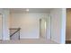 Bright hallway with modern doors and access to various rooms on the upper level at 669 Egrets Lot 56 Lndg, Covington, GA 30014